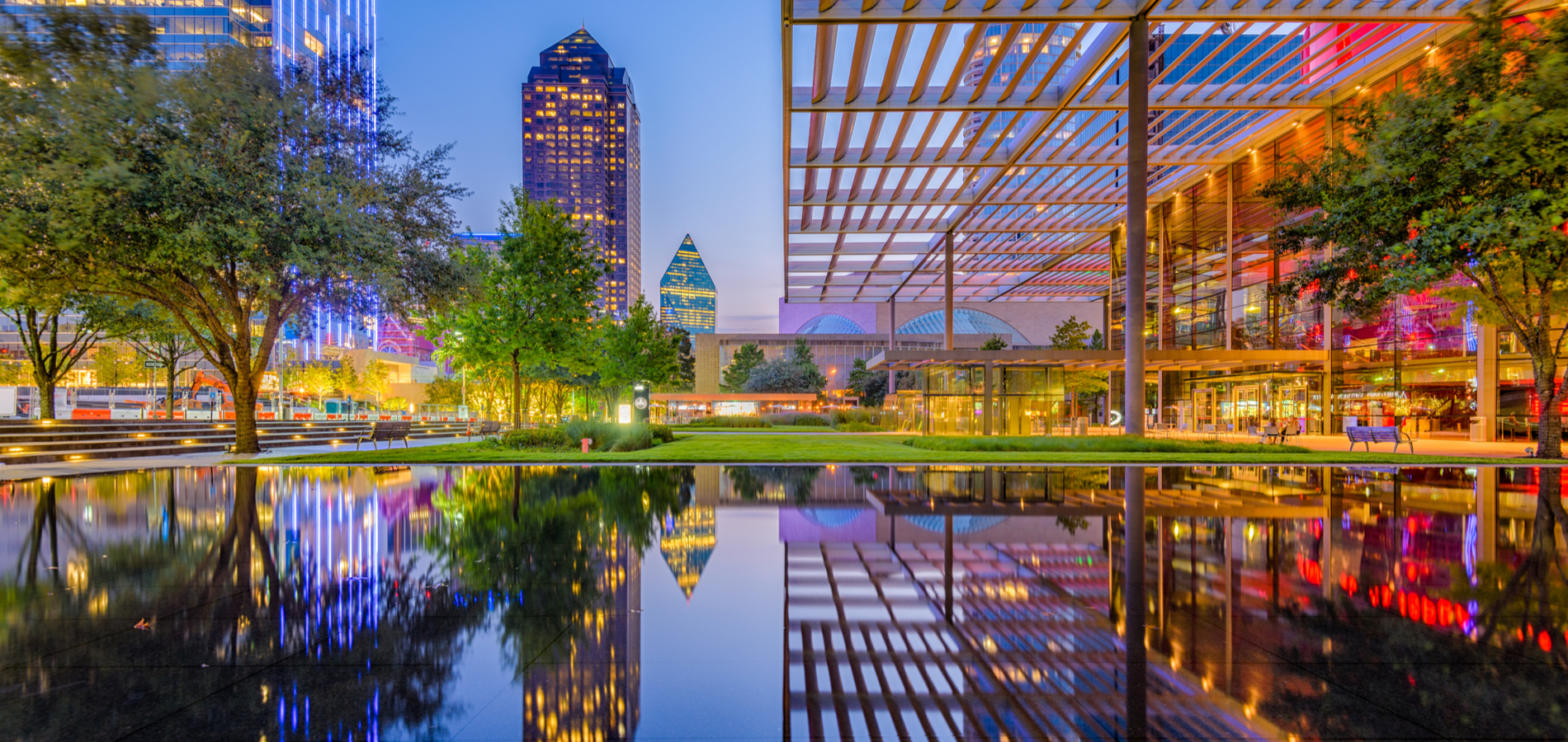 Dallas Texas Arts District at twilight with reflective water feature